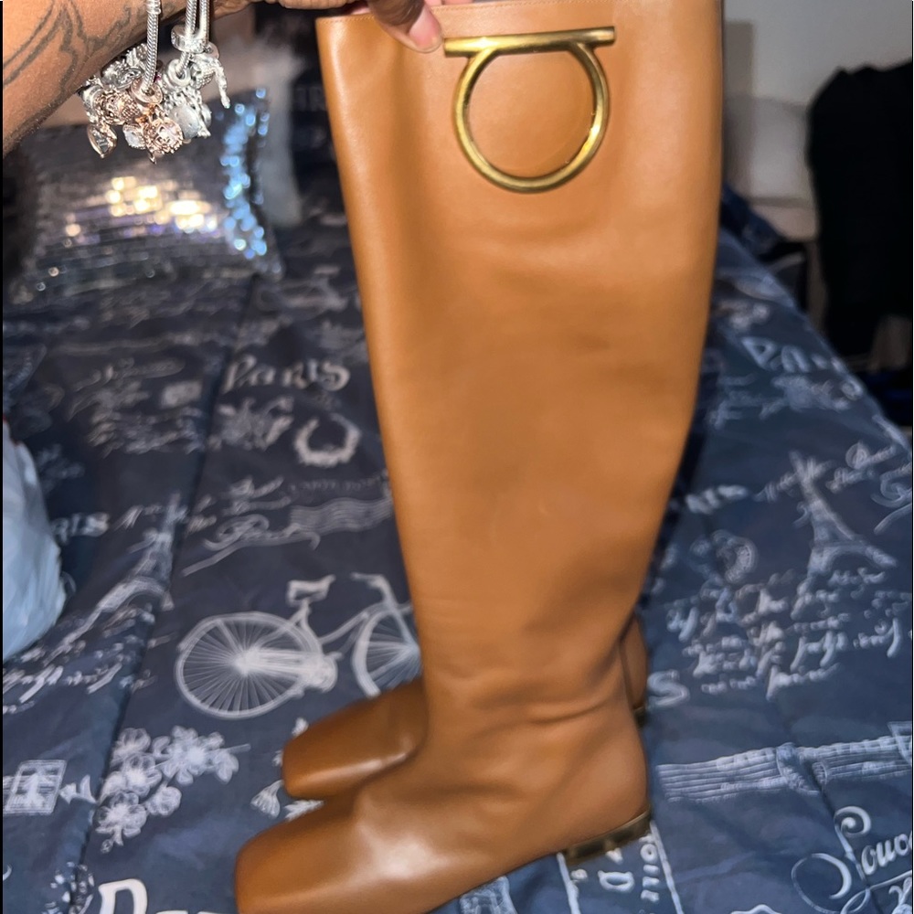brand new never worn Ferragamo boots they cost $1,590. Offers above $1000 are ok
